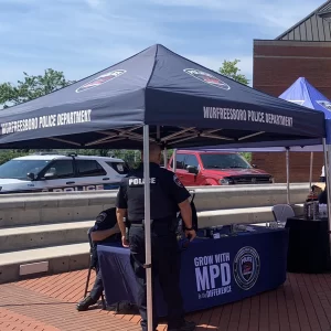 POLICE DEPARTMENT TENT OUTSIDE OF A COLLEGE