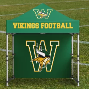 GREEN TENT WITH A VIKING HEAD ON A GRASS BACKGROUND